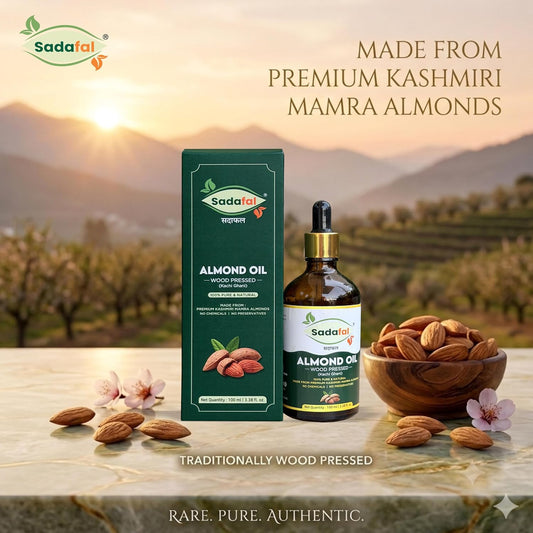 Sadafal Cold Pressed Almond Oil bottle compared with refined almond oil
